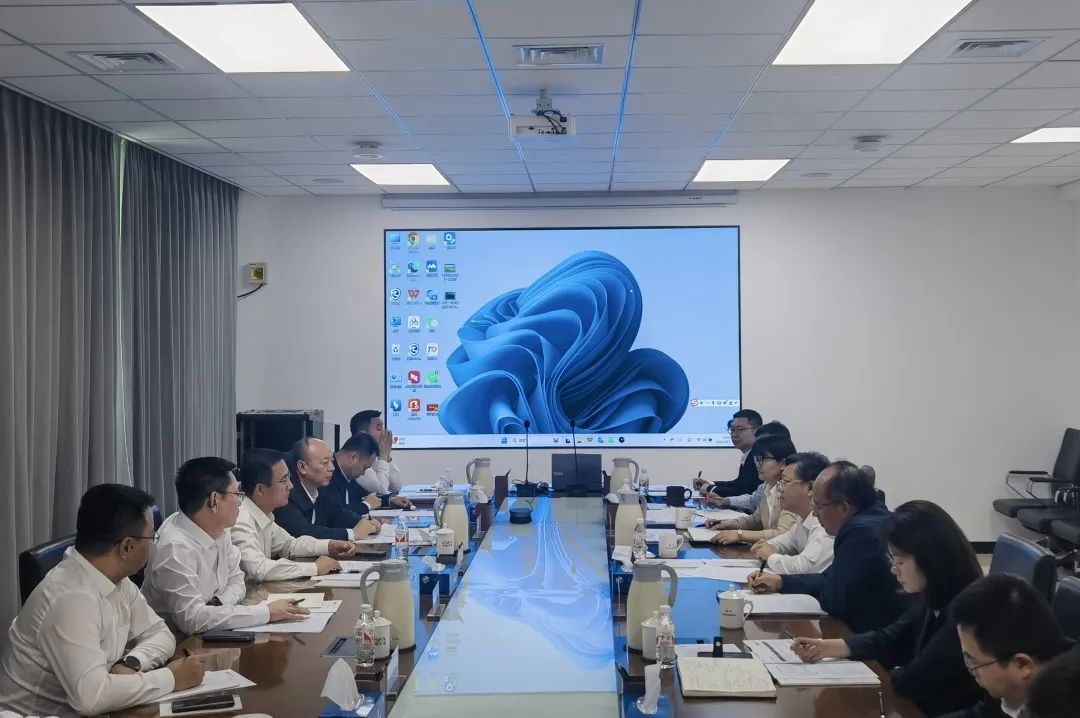 公司主要领导会见中国农垦集团党委书记、董事长张磊